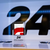 a trophy with the number 24 on it sits on a table