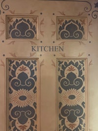 an ornate door with an ornate design on it