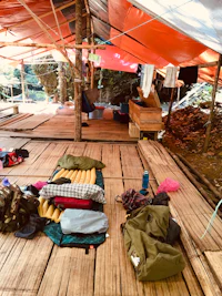 a tent with sleeping bags on the floor