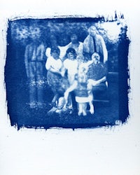 a photo of a group of people in blue ink