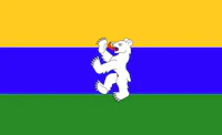 a flag with a bear holding a ball