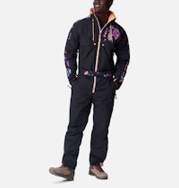 a man wearing a colorful jumpsuit