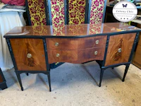 a sideboard with two drawers and two doors