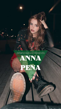 a woman sitting on a bench with the words anna pena