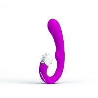 a purple and white vibrator on a white surface
