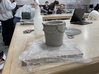 a clay pot sitting on a table