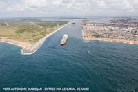 an aerial view of a ship in the ocean