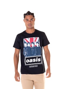 a man wearing a black t - shirt with an image of the beatles