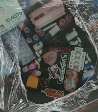 a plastic bag with a lot of items in it