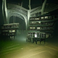 a large building in the middle of the ocean