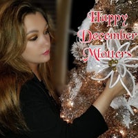 a woman decorating a christmas tree with the words happy december mothers
