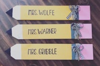 three pencils that say mrs wolfe, mrs warner and mrs wolfe