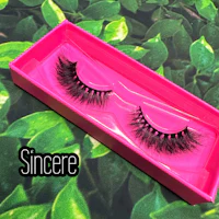 a pair of pink eyelashes in a pink box