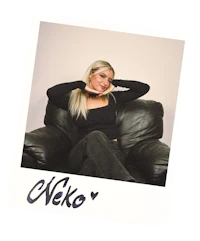 a photo of a woman sitting in a leather chair