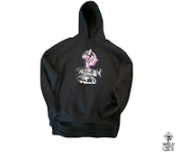 a black hoodie with a pink design on it