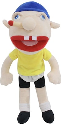 a stuffed toy with a soccer ball on his head