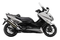 a silver and black motorcycle on a black background