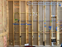 a room is being framed and wired for a new bathroom