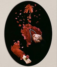 an image of a woman laying on top of a flower