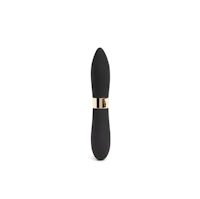 a black and gold vibrator on a white background
