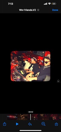 a picture of a dj playing music on an iphone