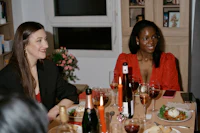 a group of women at a dinner table