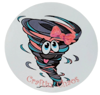 a round sticker with the word crafty chaos on it