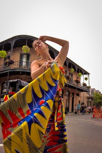 a woman wearing a colorful dress