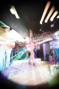 a blurry image of a man playing a game of frisbee