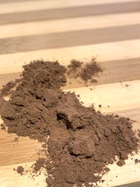 cocoa powder on a wooden table