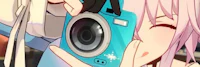 a girl with pink hair is taking a picture with a camera