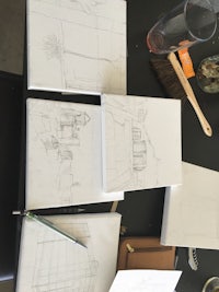 sketches of a house on a table
