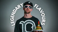 a man holding a burger with the words legendary flavours