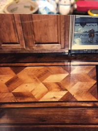 a picture of a wooden door with a pattern on it