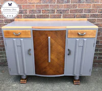 a grey and wood sideboard with two drawers