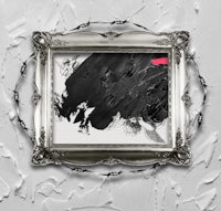 a black and white painting is framed in a silver frame