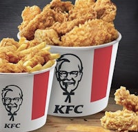 a kfc bucket with french fries and chicken