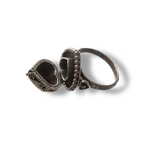 a silver ring with a stone in the middle