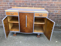 a sideboard with two doors and two drawers