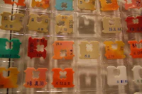 a display of different colored numbers in a case