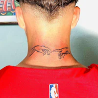 the back of a man's neck with a tattoo of the hands of adam