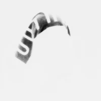 a black and white photo of a man wearing a hat