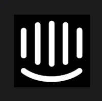 a white smiley face logo on a black background