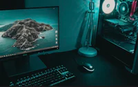 a computer with a monitor, keyboard and mouse