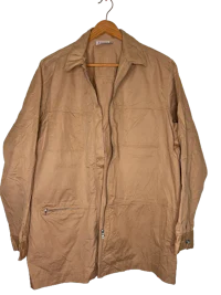 a tan jacket hanging on a hanger