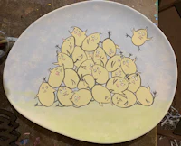a plate with a bunch of chickens on it