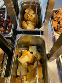 a buffet with a lot of food in it