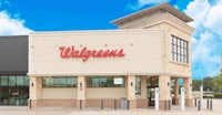 a walgreens store with a blue sky