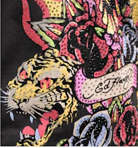 a black t - shirt with a tiger and roses on it
