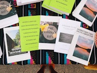 a table full of books on a table